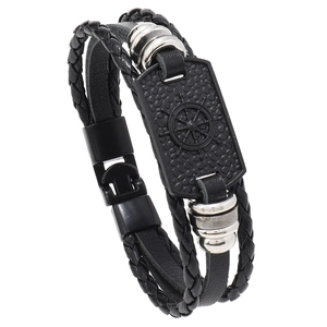 Men's multilayer braided leather anchor bracelet with nautical helm charm and silver rings