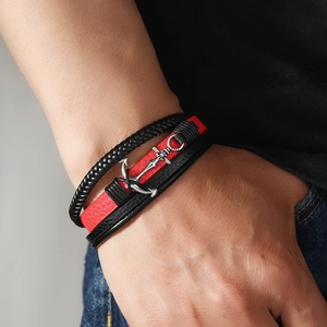 Men's multilayer leather anchor bracelet featuring black braided cord and red textured strap