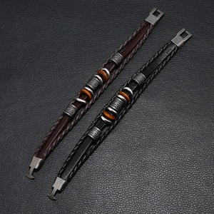 Vintage multi-layer braided leather bracelet with silver metal beads and wooden rings