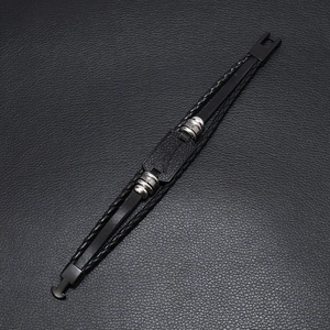 Men's multilayer black leather bracelet featuring an Eiffel Tower motif and metal rings