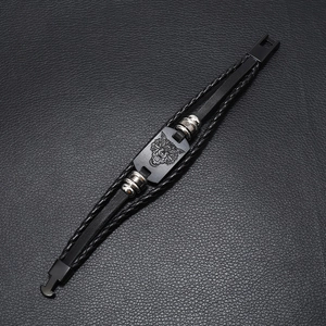 Men's multi-layer woven leather Viking wolf head bracelet with black metal plaque