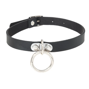 Detail of adjustable pin buckle closure and silver metal ring on black PU leather choker
