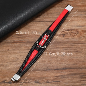 Detailed view of multilayer leather bracelet with silver anchor clasp showing 21cm length