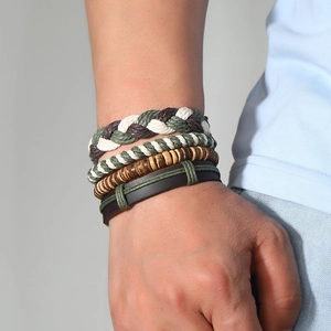 Men's bohemian multi-layer braided leather bracelet set with wooden beads worn on wrist