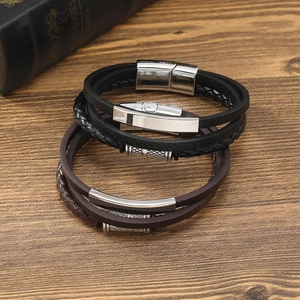 Close-up of multilayer braided leather bracelets with stainless steel magnetic clasps