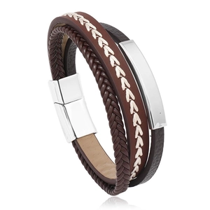 Detail of multi-layer woven leather bracelet with silver magnetic clasp and arrow pattern