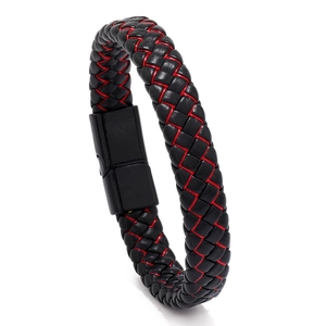 Detail of woven black leather bracelet featuring red stitching and a magnetic metal clasp