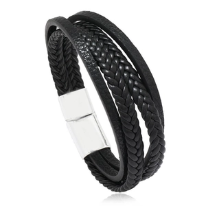 Detail of multi-layer braided black leather men's bracelet with silver magnetic clasp