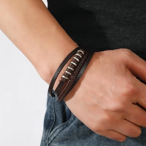 Men's multilayer leather bracelet with braided ropes and magnetic clasp on wrist
