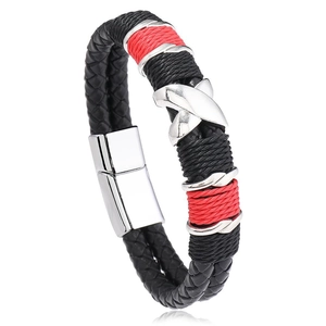 Detail of multi-layer black and red braided leather bracelet with silver magnetic clasp