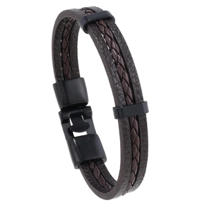 Macro view of multi-layer vintage brown leather bracelet with black magnetic clasp
