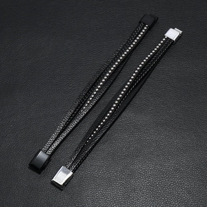 Men's multilayer braided leather bracelet with silver and black magnetic clasps and studs