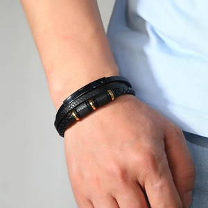 Men's multilayer braided leather bracelet with black knurled metal beads and steel clasp