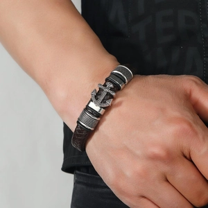 Men's retro braided leather bracelet featuring a vintage silver anchor charm and metal accents