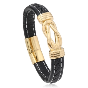 Men's braided black leather bracelet with a gold magnetic clasp and knot design