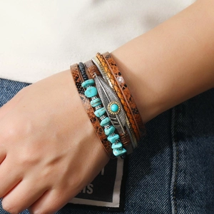 Bohemian multi-layer wrap bracelet featuring turquoise beads and silver feather pendant