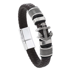 Detail of brown braided leather bracelet with silver anchor motif and magnetic clasp