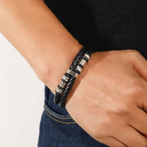 Men's double-wrap braided black leather bracelet with silver metal charms and magnetic clasp