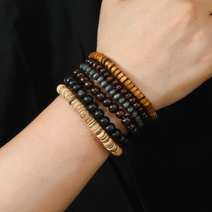 Five-piece multi-layered natural wood bead bracelet set with ethnic bohemian style