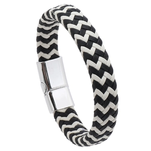 Close-up of black and white braided leather bracelet with a polished magnetic metal clasp