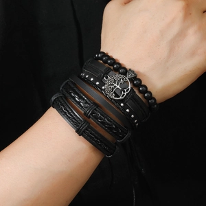 Men's 12-piece black leather bracelet set featuring Tree of Life charms and metal studs