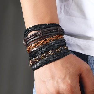 Men's vintage multilayer braided leather bracelet set with metallic beads on wrist