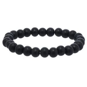 Detail shot of a matte black beaded bracelet with smooth texture on white background
