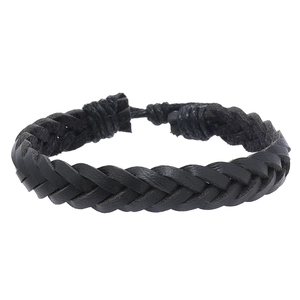 Detail of hand-woven black leather bracelet showing braided texture and adjustable closure