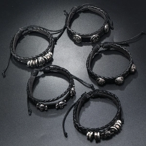 5-piece set of men's punk skull bracelets with black braided leather and silver beads