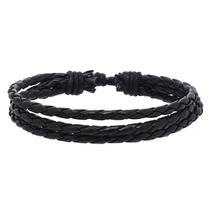 Detail of multi-layer black leather braided bracelet with adjustable knotted closure
