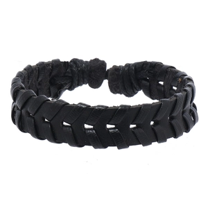 Detail of black leather bracelet featuring a herringbone woven pattern and knot closure