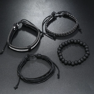 Men's 4-piece set of black braided leather bracelets with matte beads and punk charms