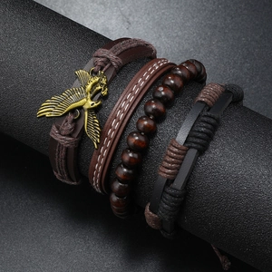 Men's 4-piece vintage layered bracelet set with leather, wood beads, and eagle charm