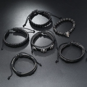 6-piece men's punk bracelet set featuring leather braids, wolf head, and skull charms