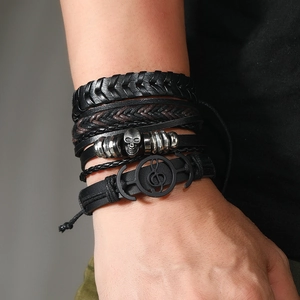 Men's leather bracelet set featuring woven skull and music note charms in punk rock style