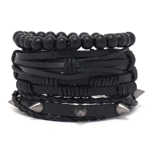 Men's 4-piece punk bracelet set with black beads, woven leather straps, and silver metal spikes