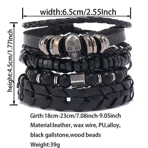 Detail view of multi-layer men's bracelet set with black beads and leather straps