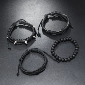 Men's 4-piece punk leather bracelet set with studs, woven ropes, and matte black beads