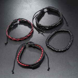 Punk style men's bracelet set featuring wood beads and braided leather on dark background