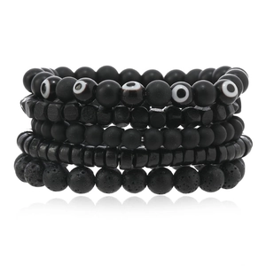 Five-piece black beaded evil eye bracelet set with natural lava stone and wooden beads