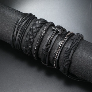 Men's multi-layer black woven leather bracelet set with metallic battle axe pendant