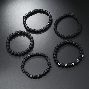 5-piece men's beaded bracelet set featuring black lava stone and blue evil eye charm