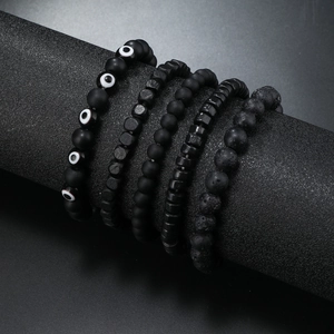 Set of 5 men's black beaded bracelets featuring evil eye charm and volcanic lava stones