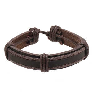 Detail of multi-layer braided leather bracelet with adjustable pull-string knot closure