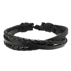 Detail of multi-layer braided black leather bracelet with retro punk weave style