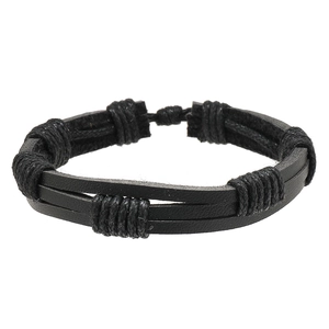 Close-up of black multilayer braided leather bracelet with cord wrap details and vintage style