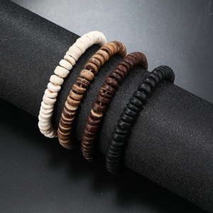 Multilayer natural wood bead bracelet set with flat disc beads in four natural colors