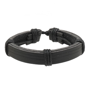 Detail of 12-piece set multilayer black leather braided bracelets with cord accents
