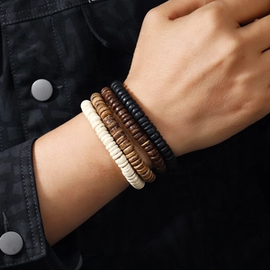 Handmade multilayered wooden bead bracelet set with natural coconut shell style textures