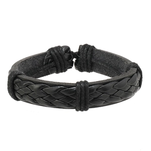 Detailed close-up of multilayer braided black leather bracelets with woven cord texture